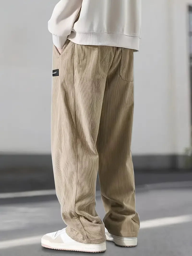Relaxed fit unisex corduroy wide leg pants, ideal for casual wear & autumn fashion.