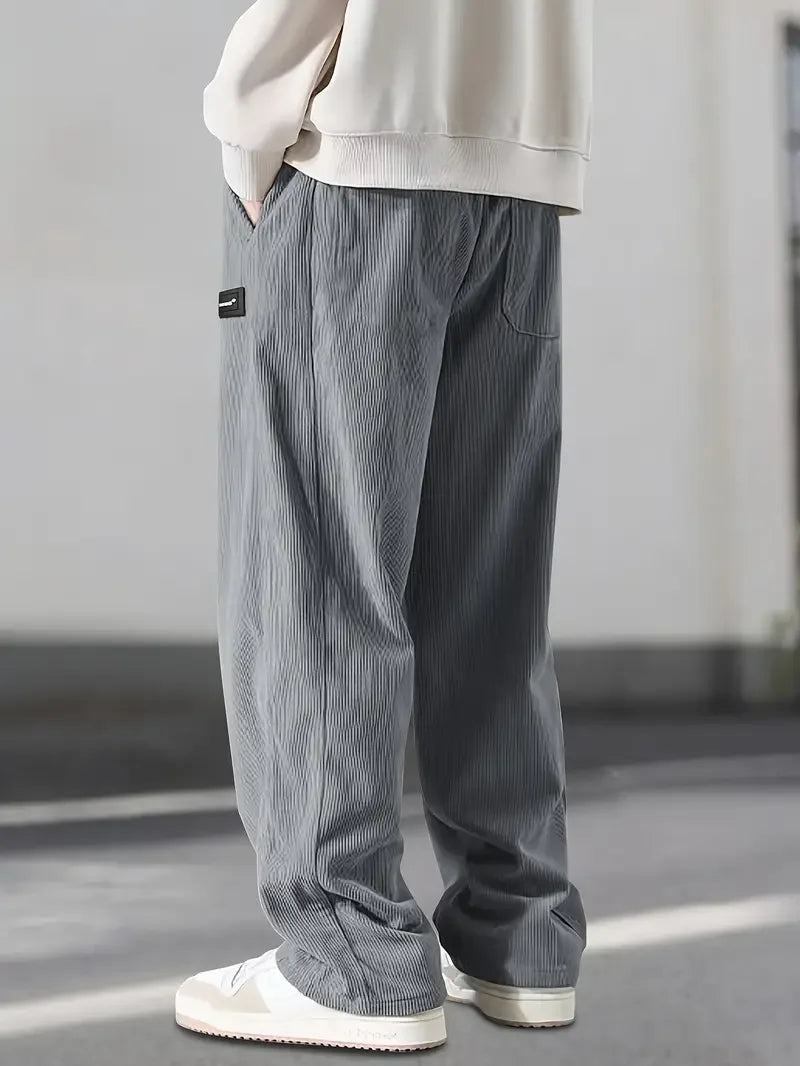 Comfortable wide leg corduroy pants, unisex design with soft fabric & vintage style.