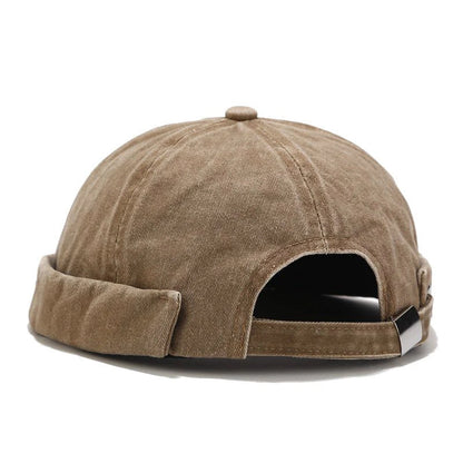 Soft cotton beanie for men & women, adjustable & breathable. Essential fall/winter accessory for casual look.