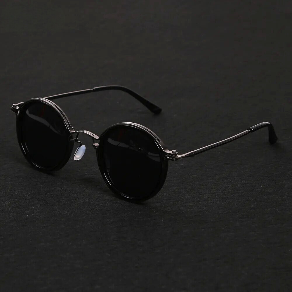 Gun metal Solis polarized sunglasses. Sleek unisex eyewear with anti-glare lenses & metal frame.