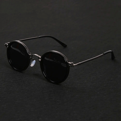 Gun metal Solis polarized sunglasses. Sleek unisex eyewear with anti-glare lenses & metal frame.