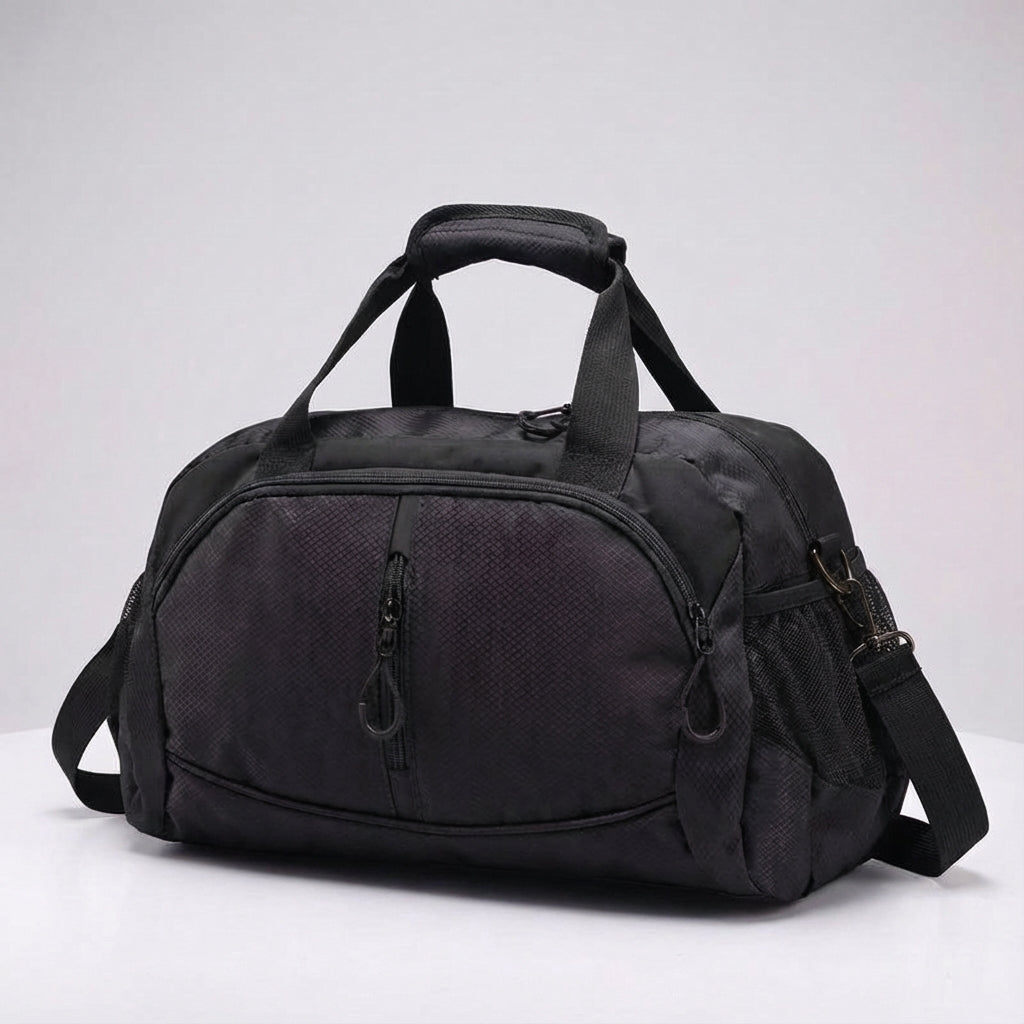 Compact unisex carry-on travel bag fitting in an overhead bin, a lightweight & durable duffel.