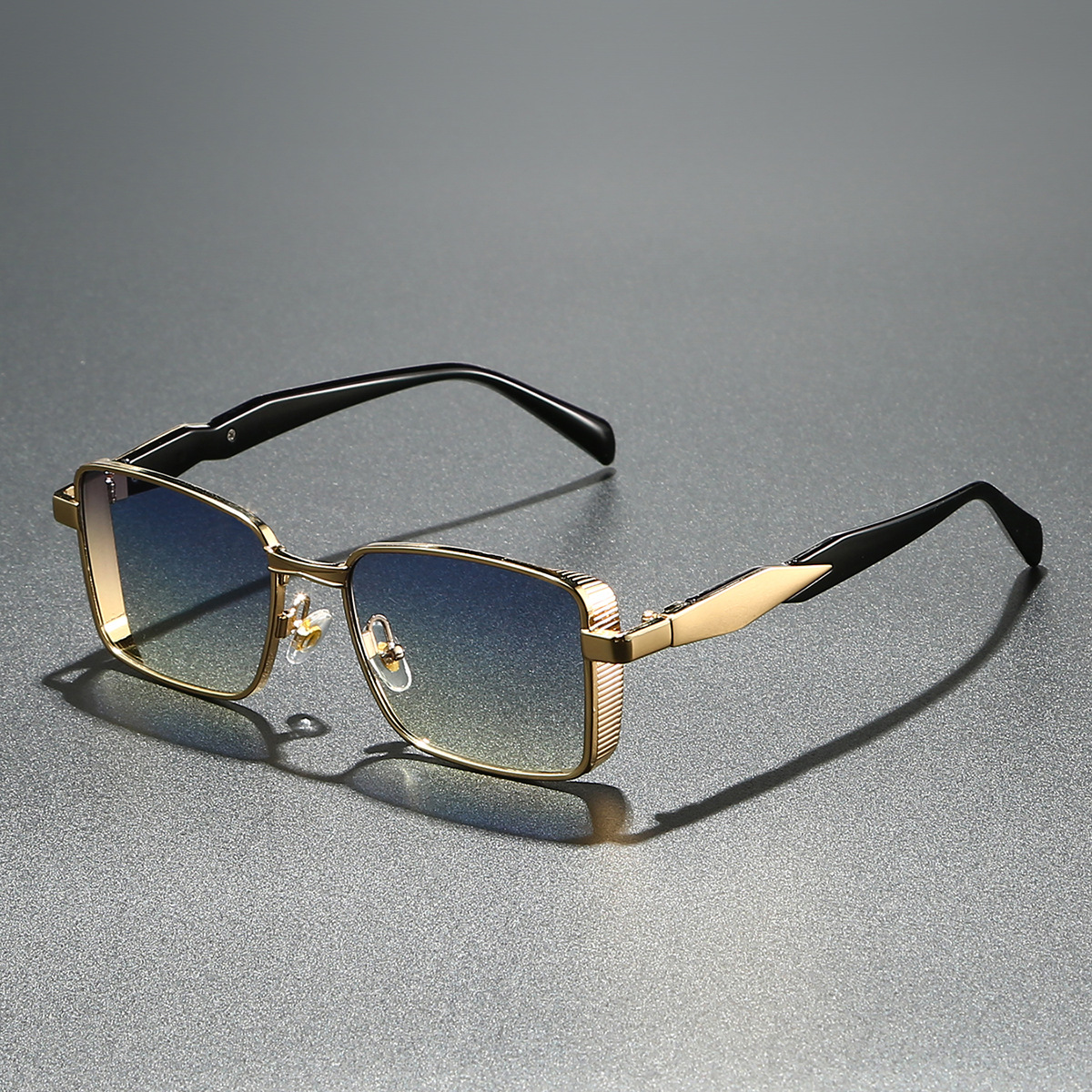 Gold frame unisex square sunglasses with gray UV protection lenses. Trendy fashion eyewear.
