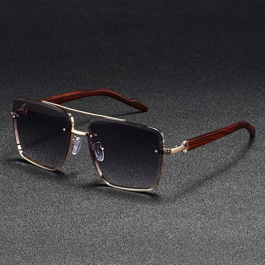 Bold square lens sunglasses with natural wood arms, making a stylish statement for unisex fashion.