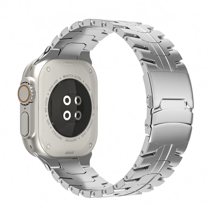 Unisex stainless steel Apple Watch band on wrist, luxury metal strap for all Series.