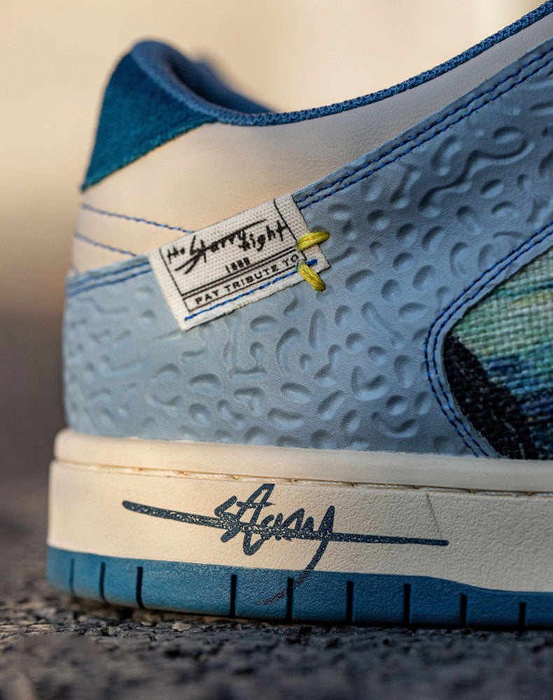 Close-up of Starry Night print on artistic sneakers, highlighting vibrant colors and unique Van Gogh design.
