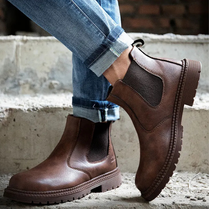 Protective steel toe Chelsea work boots, providing essential safety & comfort for demanding job site conditions.
