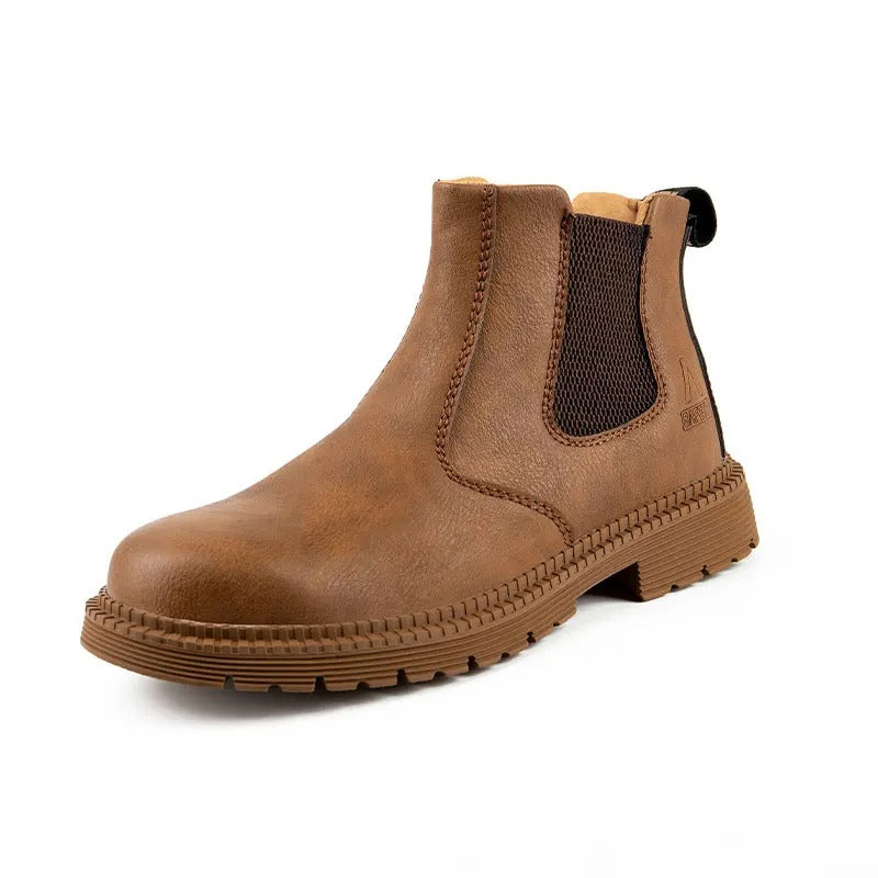 Black protective footwear: Unisex steel toe Chelsea work boots with superior grip & cushioning for job sites.