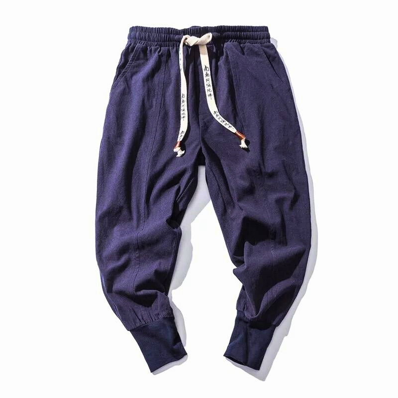 Modern unisex street style joggers. Linen-cotton blend offers comfortable, relaxed fit for everyday fashion.