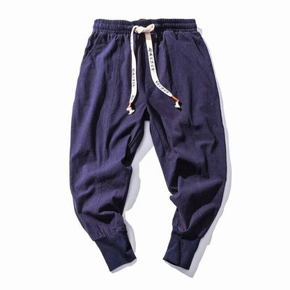 Modern unisex street style joggers. Linen-cotton blend offers comfortable, relaxed fit for everyday fashion.