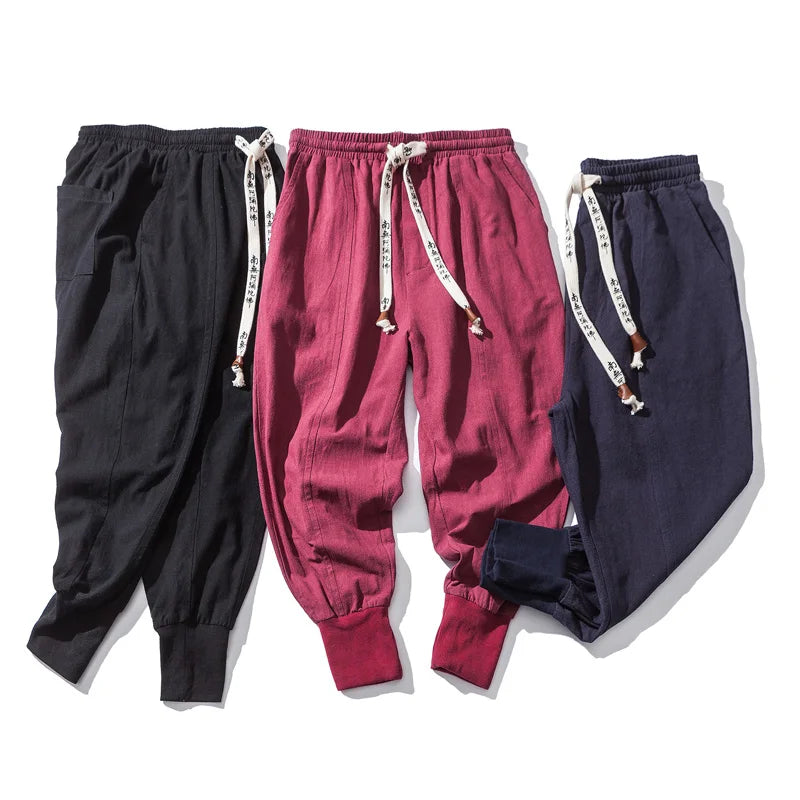 Unisex casual joggers featuring a modern street style design. Breathable linen-cotton blend with a relaxed, comfortable fit.