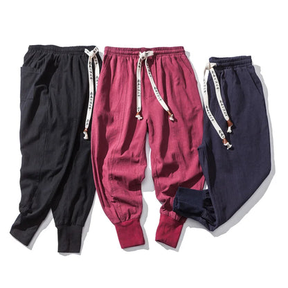 Unisex casual joggers featuring a modern street style design. Breathable linen-cotton blend with a relaxed, comfortable fit.