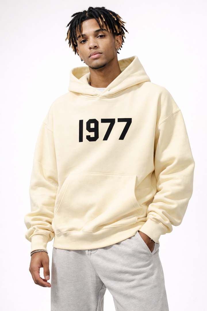 Streetwear pullover hoodie, unisex, with a retro 1977 design and stylish raglan sleeves.