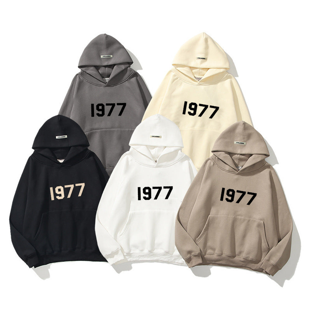 Unisex casual hoodie, featuring a retro 1977 graphic and comfortable raglan sleeve design.