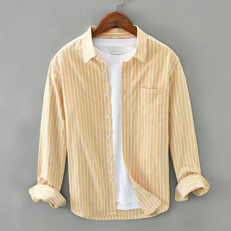 Stylish striped button-up top, a versatile unisex long-sleeve shirt for warm days and casual outfits.