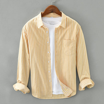 Stylish striped button-up top, a versatile unisex long-sleeve shirt for warm days and casual outfits.