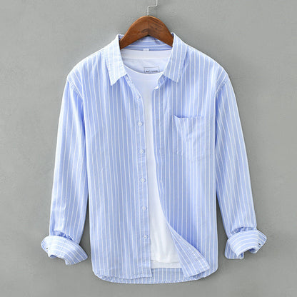 Comfortable unisex striped summer shirt, a breathable long-sleeve button-up for warm weather fashion.