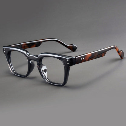 Stylish magnifying reading glasses, unisex design with clear vision. Features scratch-resistant lenses & comfortable acetate frame.