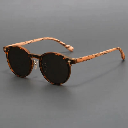 Unisex stylish round sunglasses with UV protection. Fashionable eyewear for summer.