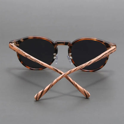 Stylish unisex round turtle frame sunglasses. Durable eyewear with full UV protection.