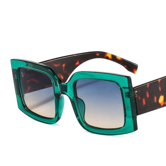 Unisex stylish square frame sunglasses with UV protection for all-day wear.