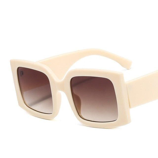Sleek square frame UV protection sunglasses for a trendy unisex look and glare-free vision.