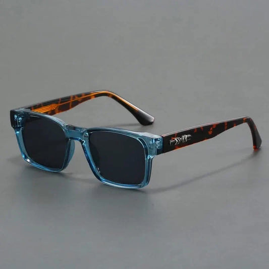 Unisex stylish squared sunglasses with UV protection. Retro design for fashion-forward eyewear.