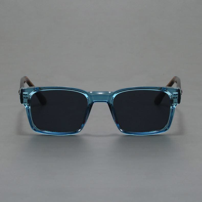 Squared frame shades offering full UV protection. Trendy unisex eyewear for sun protection.