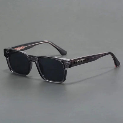 Fashionable squared sunglasses, unisex design with robust UV protection. Perfect statement eyewear.