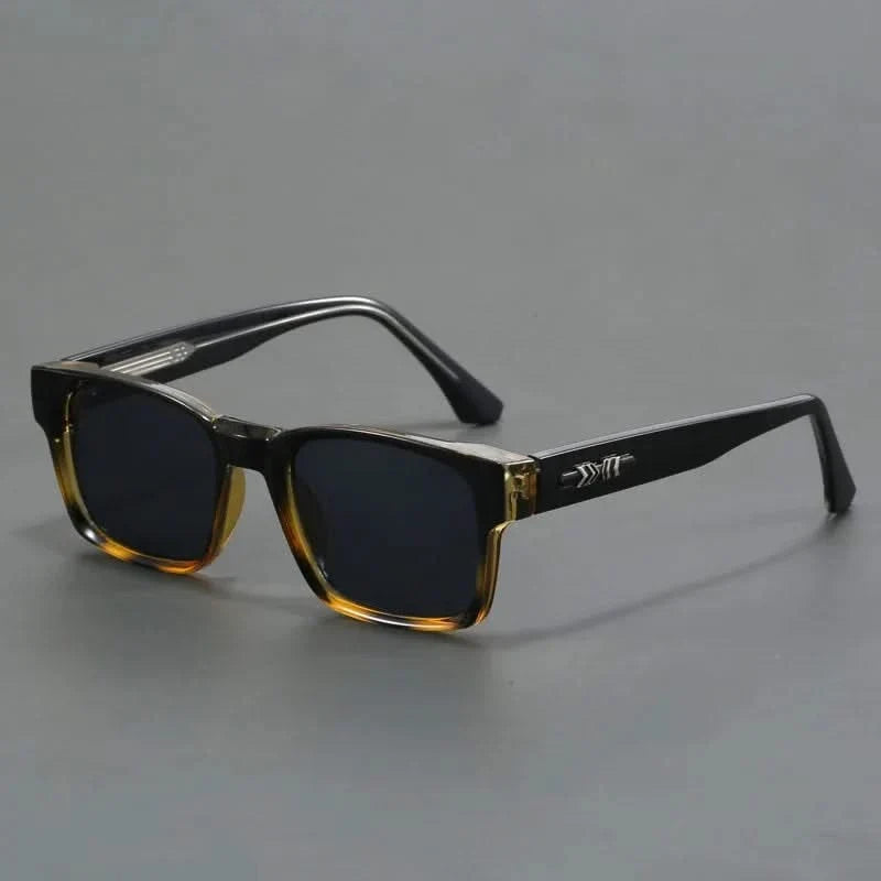 Polycarbonate squared sunglasses with advanced UV protection. Durable and fashionable unisex shades.