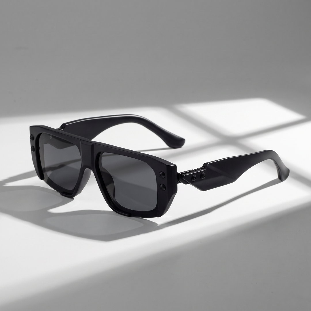 Bold black unisex sunglasses, a stylish fashion accessory with superior UV protection for eyes.