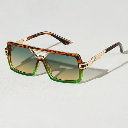 Person enjoying outdoors, wearing stylish unisex UV400 sunglasses for eye protection.