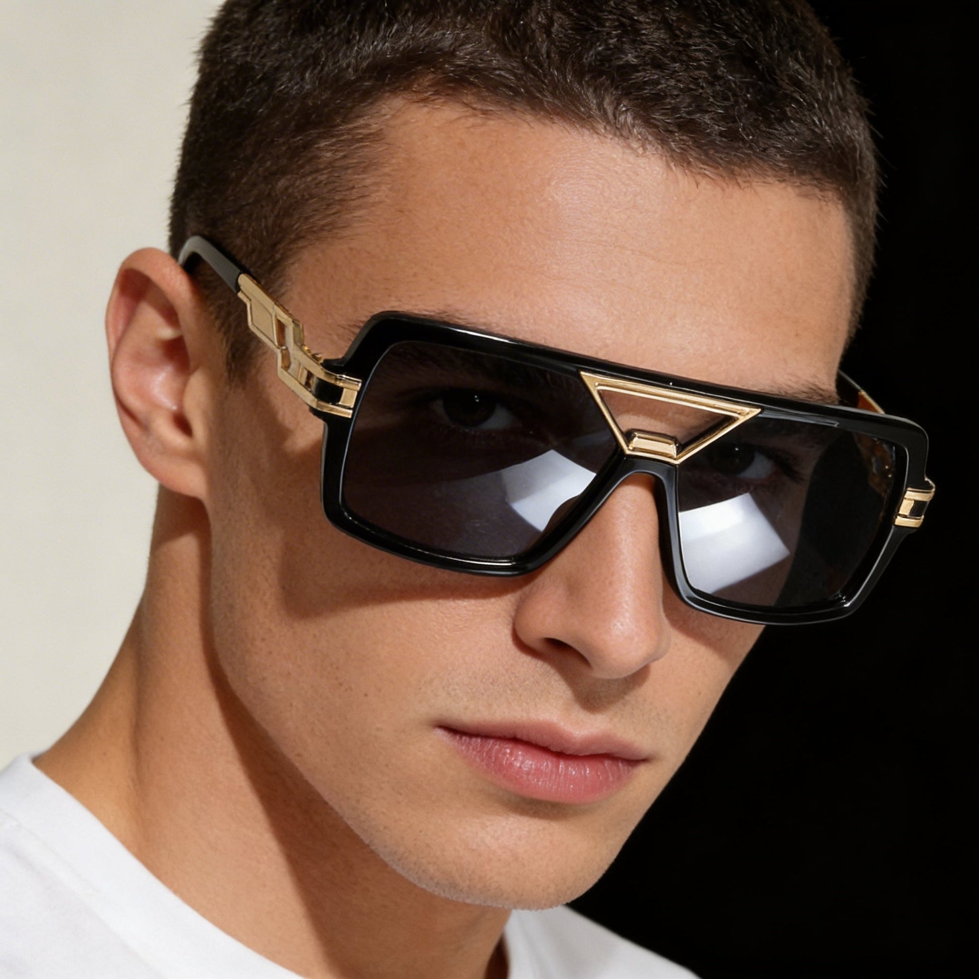 Classic black unisex sunglasses with UV400 protection, a versatile fashion accessory.