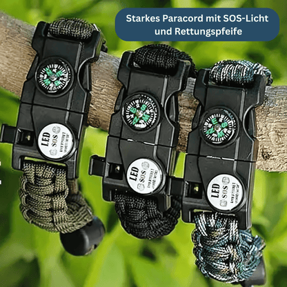 Tactical paracord bracelet, black, featuring LED light, compass, and emergency whistle.