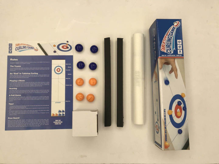 Portable Tabletop Curling game being rolled up, showcasing its easy storage and travel design.