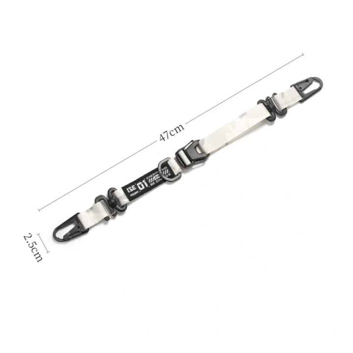 Black tactical gear utility clip close-up, showcasing its sturdy design for outdoor adventures