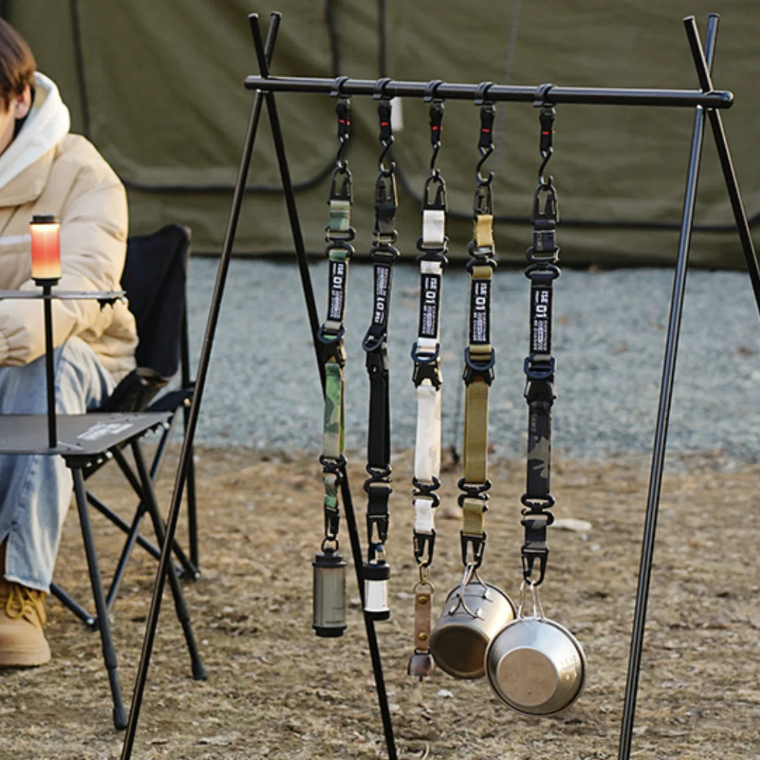 Close-up of tactical gear strap hook, heavy-duty utility clip for camping accessory organization