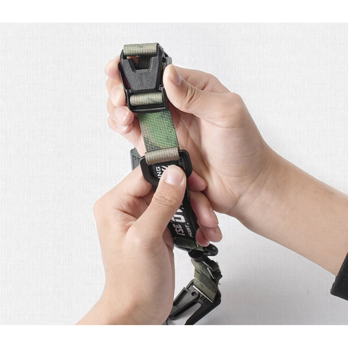 Multiple tactical strap hook clips, ideal for organizing camping gear and outdoor equipment