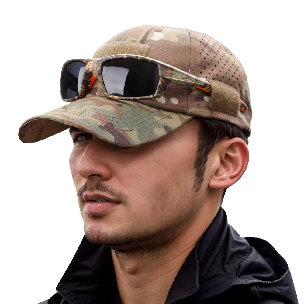 Close-up of the black tactical cap's unique sunglass slot, perfect for securing shades during outdoor performance.