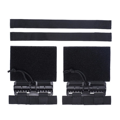 Close-up of quick release buckle, black nylon, showing robust mechanism