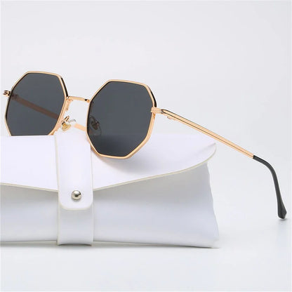 Geometric UV protection sunglasses, black frame, stylish & unisex.