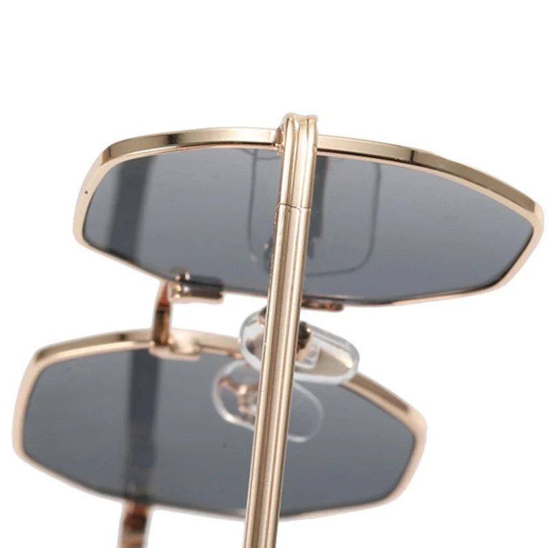 Tetragon shades with gold frame, brown lenses, perfect unisex accessory.