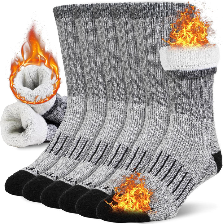 Heavy-duty insulated winter boot socks, perfect for extreme cold weather hiking, skiing, & outdoor work.