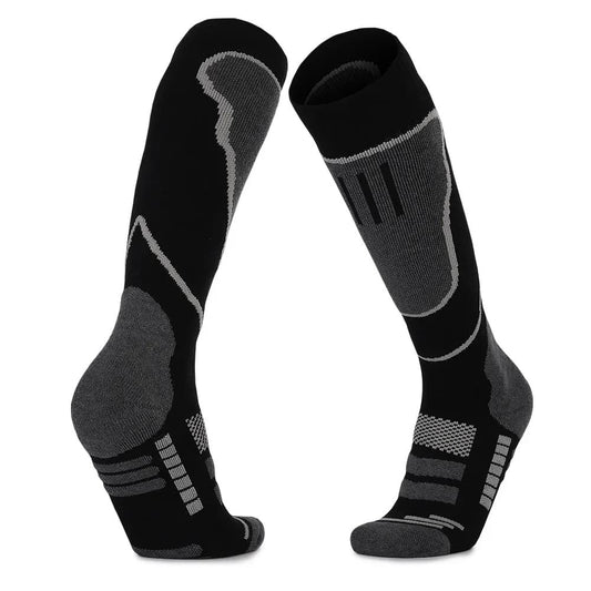 Unisex thermal ski socks, black with grey accents, designed for warmth and comfort on the slopes.