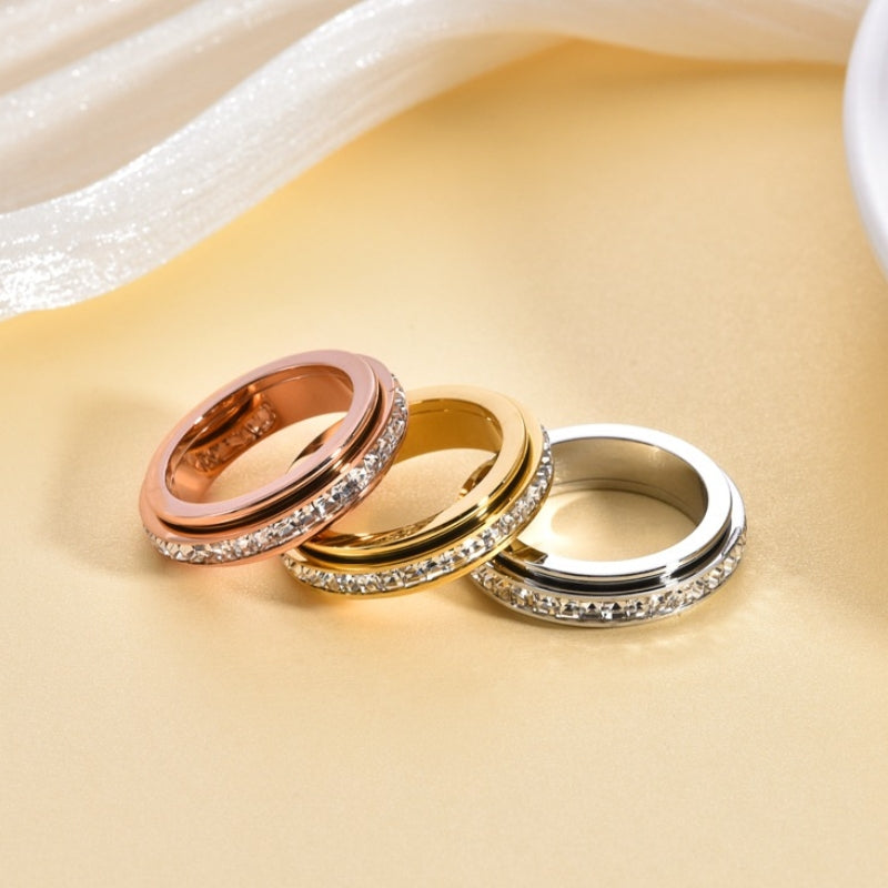Stylish CZ titanium steel anxiety ring, a calming fidget spinner for stress relief.