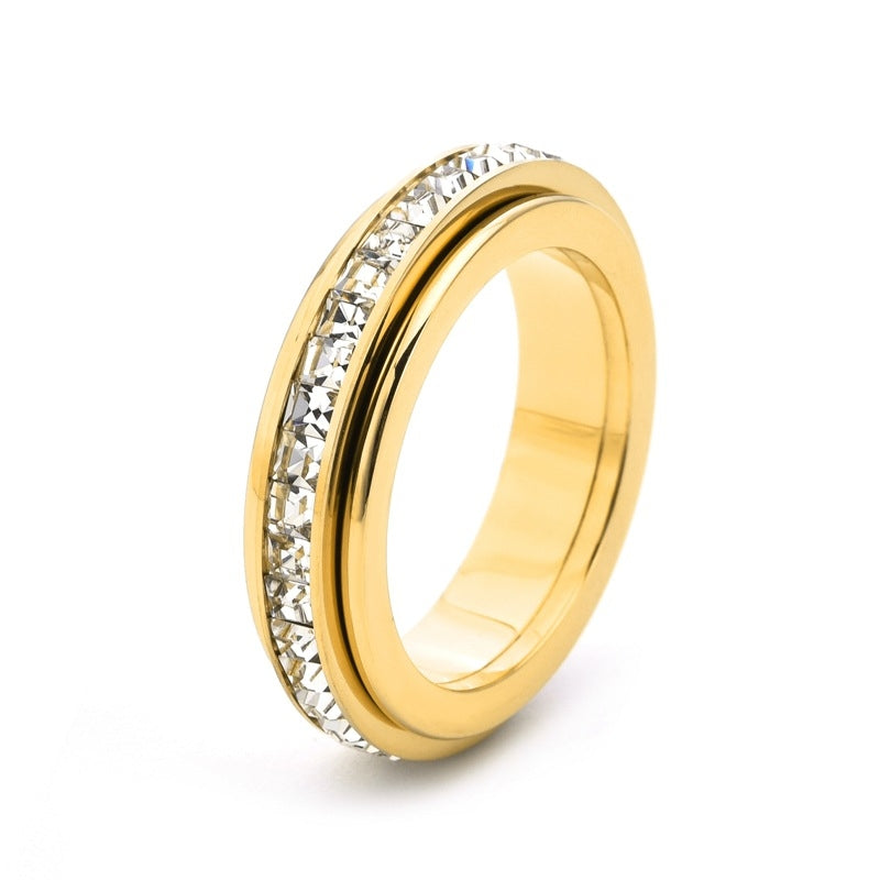 Durable titanium steel anxiety fidget ring with sparkling CZ for discreet stress relief.