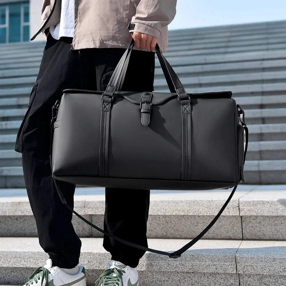 Unisex travel duffle bag, perfect for weekend getaways & short trips. Durable and spacious carry-on.