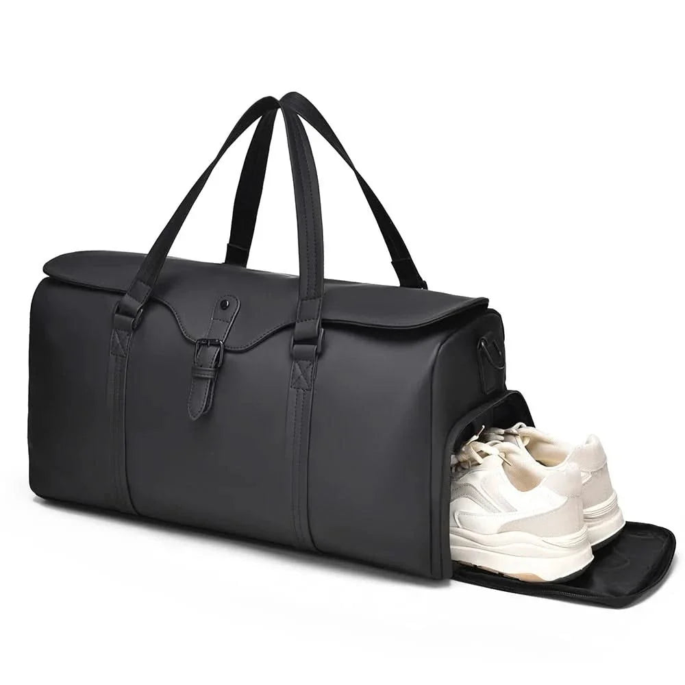 Grey unisex travel duffle bag, durable & lightweight, with an adjustable shoulder strap for comfort.