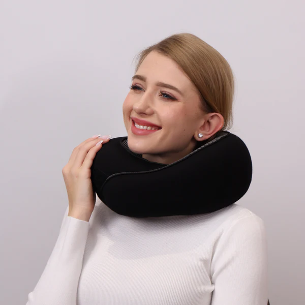 Comfortable unisex travel pillow with ergonomic design, offering superior neck support for all types of journeys.