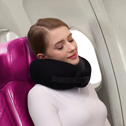 Unisex journey pillow, an ergonomic travel accessory for comfortable neck support during flights & car rides.